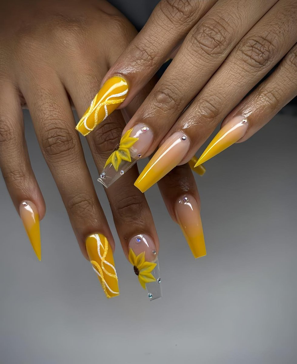 Yellow sunflower stiletto nails
