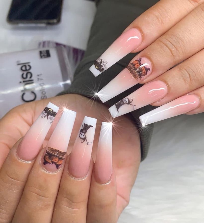 Pink ombré Halloween nails with hand-painted ghost and pumpkin art