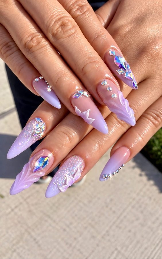 Lavender stiletto nails with crystals and 3D floral art